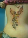 phoenix back tattoo for girl